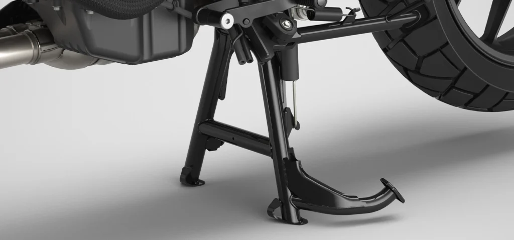 Acessório usado em modelos como: Honda NX 500. Cavalete central extremamente resistente, o qual proporciona maior praticidade ao estacionar em diferentes superfícies.